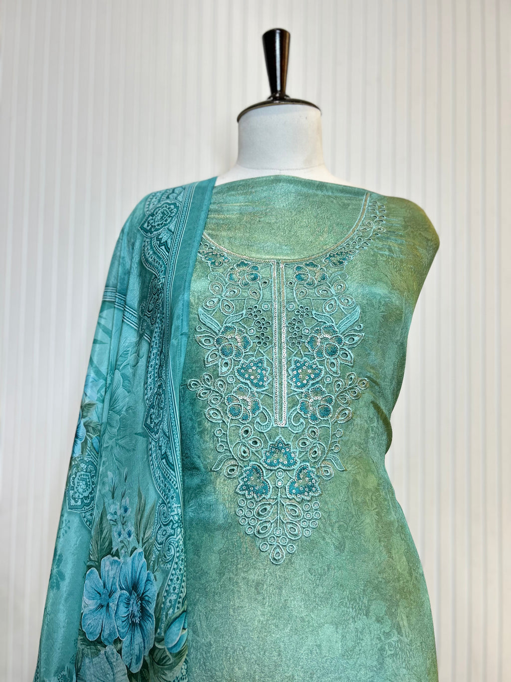 Shimmer Unstitched Printed Suit with Embroidered, Boring And Sequins Work Neck And Embroidered Cutwork Ghera Paired With Digitally Printed Tabby Dupatta