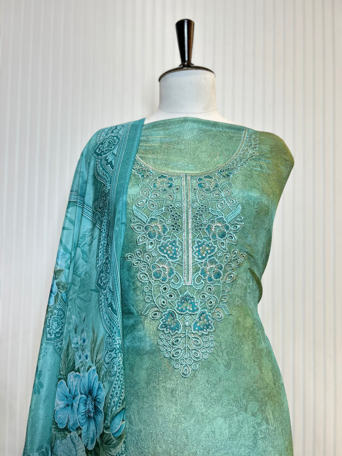 Shimmer Unstitched Printed Suit with Embroidered, Boring And Sequins Work Neck And Embroidered Cutwork Ghera Paired With Digitally Printed Tabby Dupatta