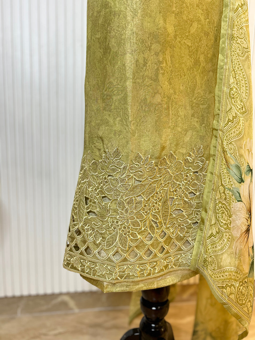 Shimmer Unstitched Printed Suit with Embroidered, Boring And Sequins Work Neck And Embroidered Cutwork Ghera Paired With Digitally Printed Tabby Dupatta