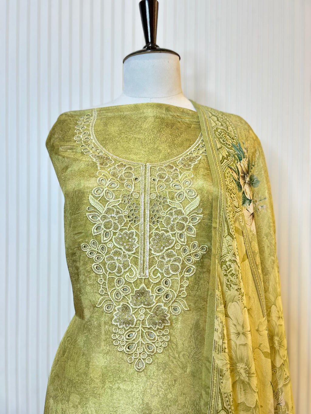 Shimmer Unstitched Printed Suit with Embroidered, Boring And Sequins Work Neck And Embroidered Cutwork Ghera Paired With Digitally Printed Tabby Dupatta