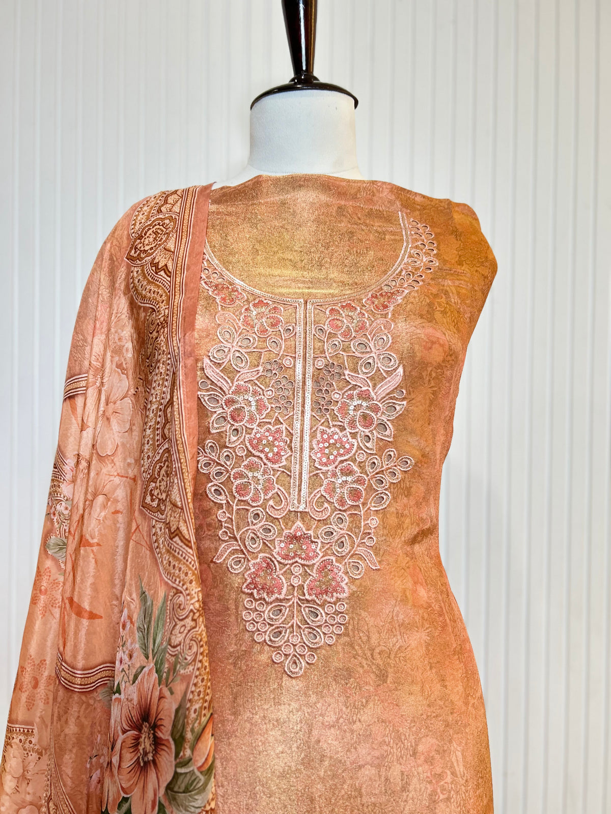 Shimmer Unstitched Printed Suit with Embroidered, Boring And Sequins Work Neck And Embroidered Cutwork Ghera Paired With Digitally Printed Tabby Dupatta