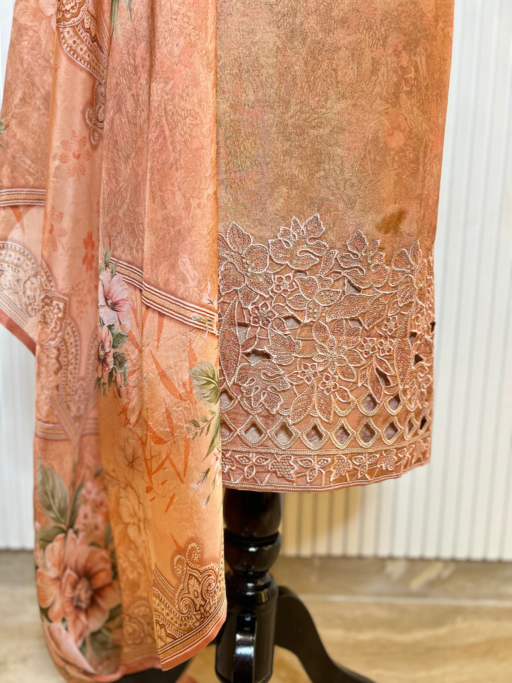 Shimmer Unstitched Printed Suit with Embroidered, Boring And Sequins Work Neck And Embroidered Cutwork Ghera Paired With Digitally Printed Tabby Dupatta